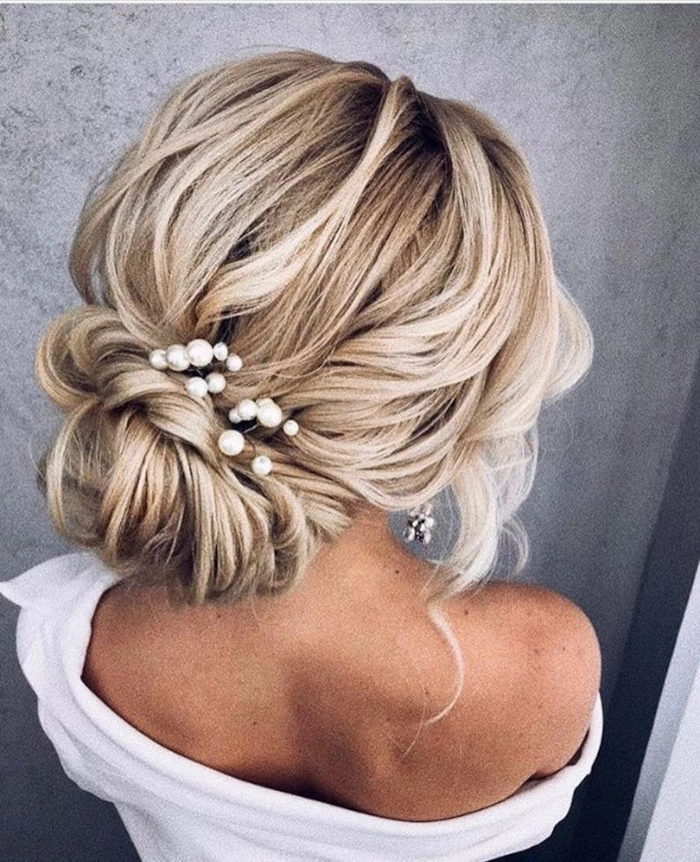Date night hairstyle with pearl hairpins elegantly placed in loose waves