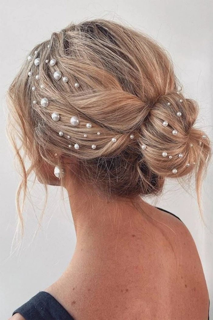 Romantic date night hairstyle adorned with pearl hairpins