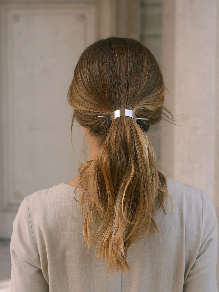 Stylish date night ponytails with metallic hair cuffs for an elegant look