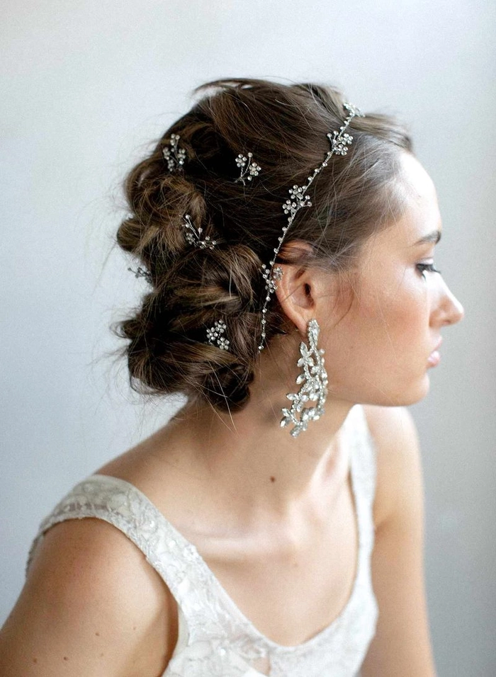 Elegant chignon hairstyle with jeweled hair comb for date night