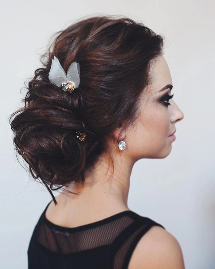 Elegant updo hairstyle designed to flatter square jawlines, suitable for date night occasions