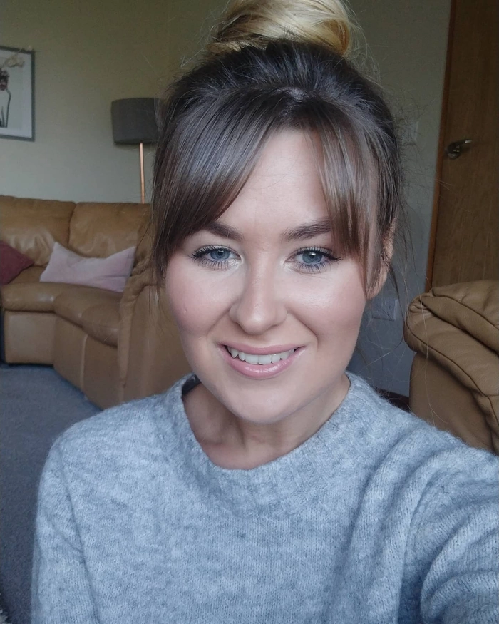 Elegant side swept bangs hairstyle for a romantic date night look