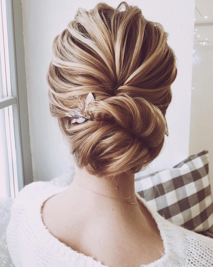 Elegant updo hairstyle for square jawline ideal for date night