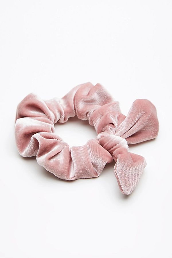 Elegant updo with velvet scrunchies perfect for a romantic date night Romantic evening hairstyle with velvet scrunchies for date night