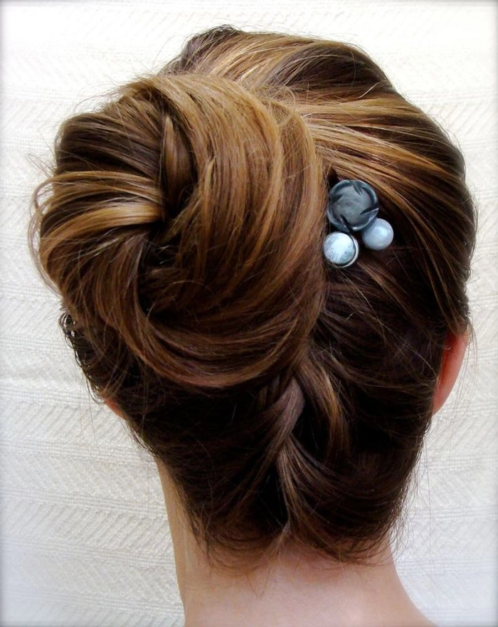 Date night hairstyle featuring sparkling bobby pins in an updo Elegant evening updo with decorative bobby pins for a romantic date night