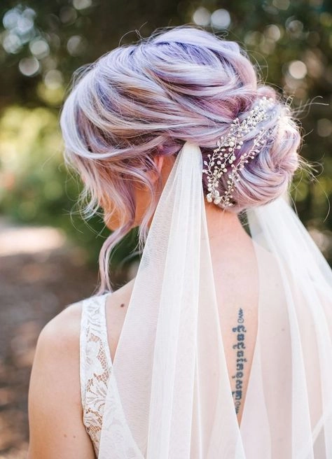Stunning fantasy hair updo perfect for a night out Romantic evening updo with vibrant fantasy hair colors for a date night look