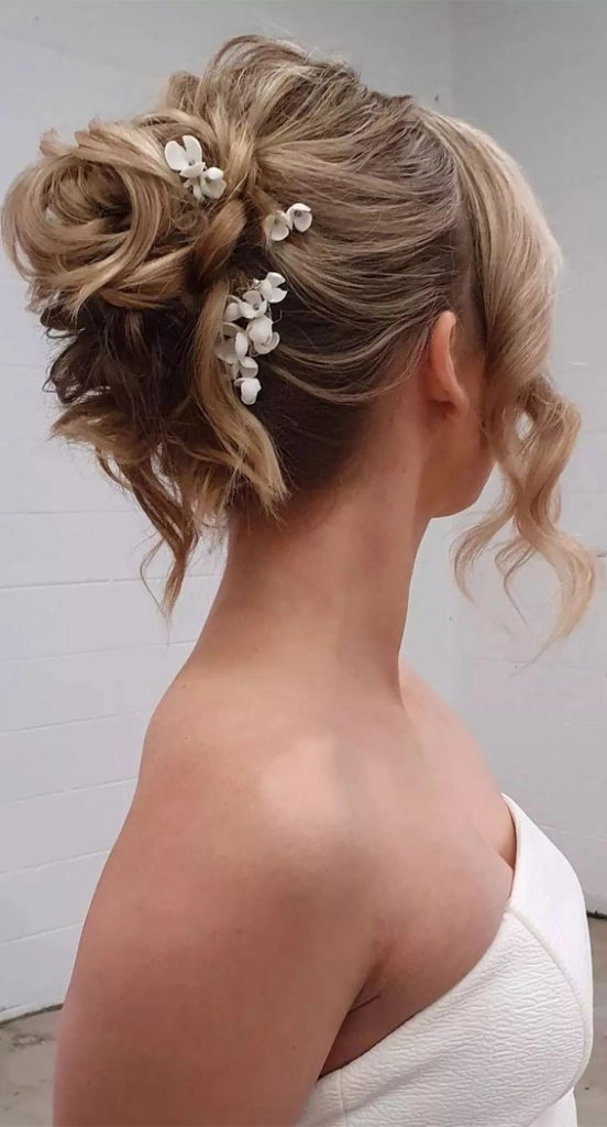 Stylish fantasy hair updo with vivid hues ideal for romantic evenings Elegant evening updo showcasing vibrant fantasy hair colors for a date night look