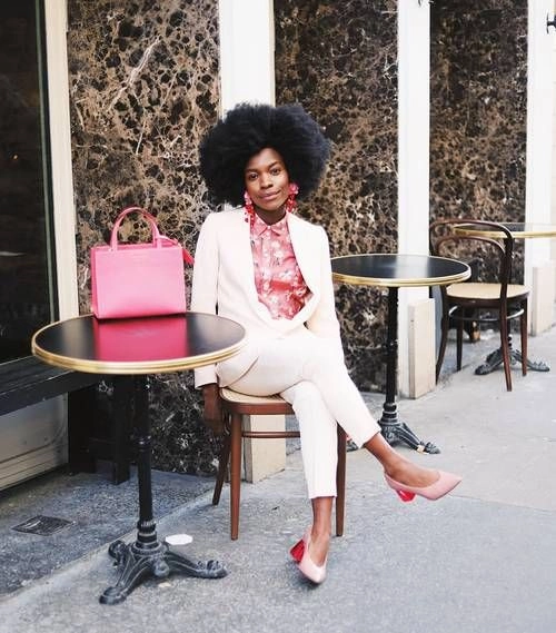 Date night hair inspiration for upscale dining attire Woman with sophisticated updo complementing fancy restaurant dress code