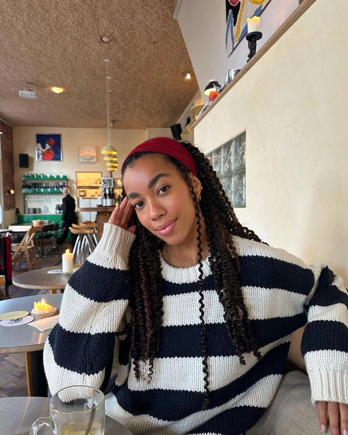 Modern braided crown hairstyle for a stylish date night look Gen Z trendy date night hair with braided crown and soft waves