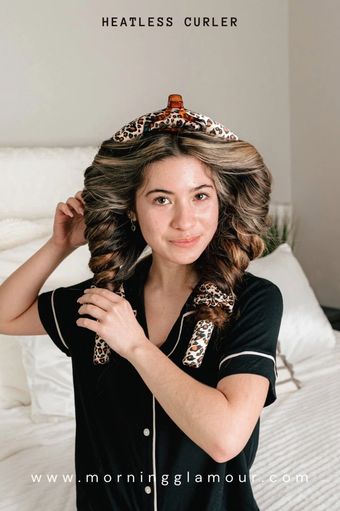 Heatless Romantic Curls for Date Night Look A woman with heatless romantic curls styled for a date night, smiling softly in soft lighting