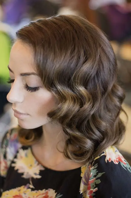 Medium length romantic curls styled for an evening date night