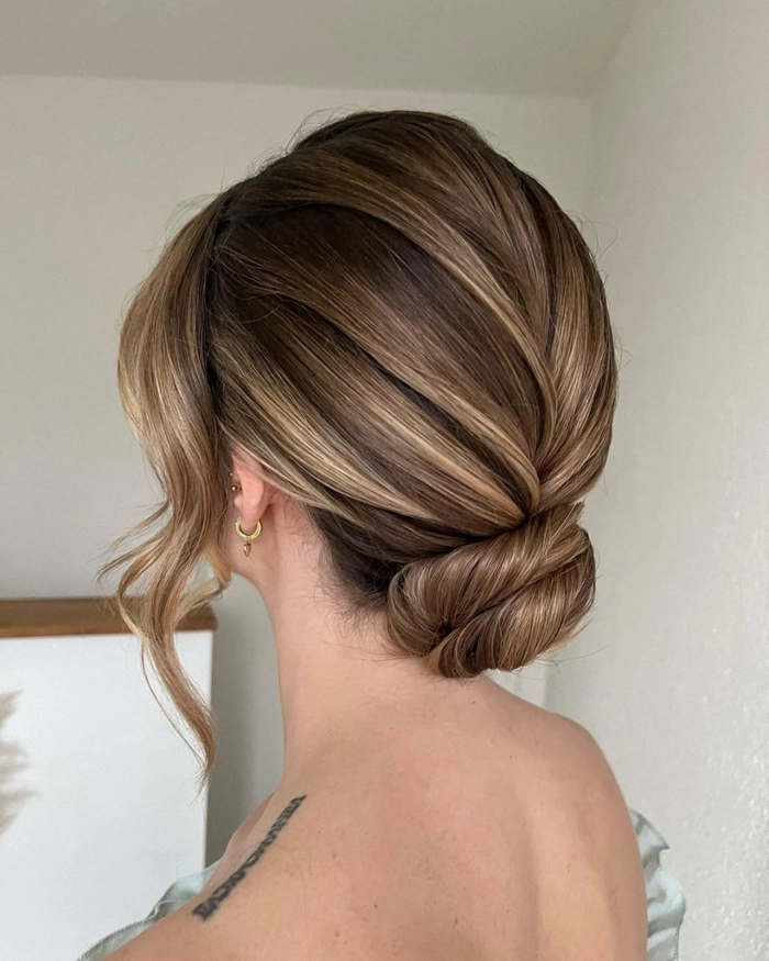Gentle low manipulation updo style for damaged hair, perfect for date night Low manipulation evening updo for damaged hair with soft braids and pins