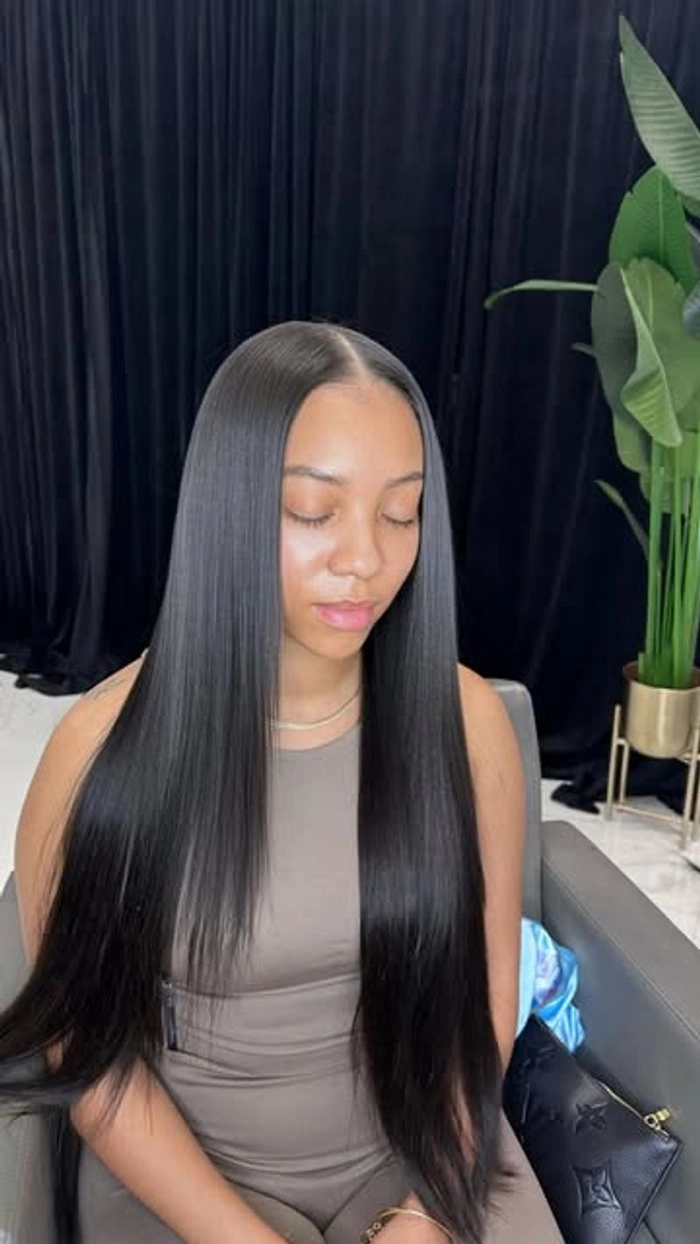 Perfect date night hair with a polished middle part and straight smooth texture Sleek middle part straight hair styled for a romantic dinner date