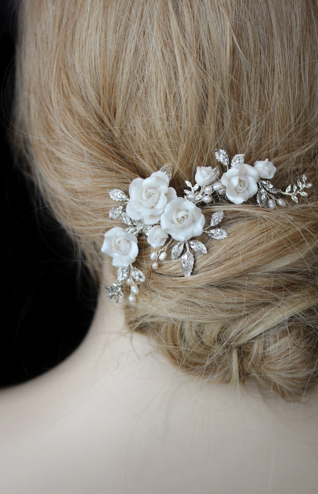 A sophisticated date night chignon adorned with a jeweled hair comb