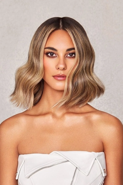 Elegant evening hairstyle highlighting facial features for a romantic date night look