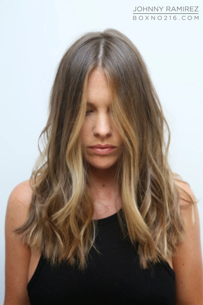 Elegant evening hairstyle that highlights facial features for a romantic date night look