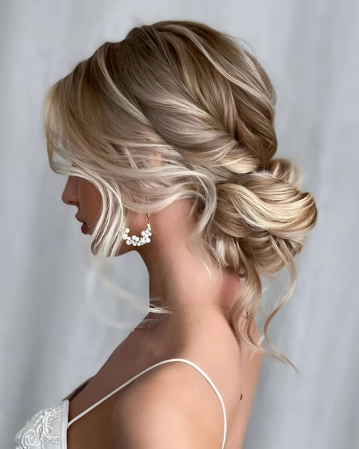 Elegant updo hairstyle for a square jawline, ideal for a romantic date night look