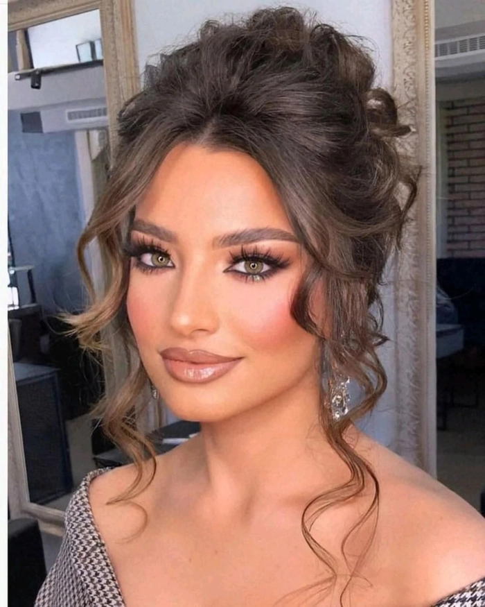Layered hair textured evening updo hairstyle for a date night look