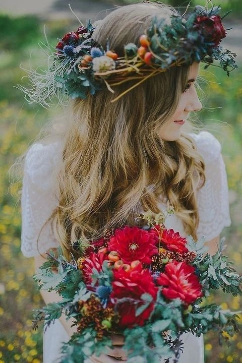 Romantic braided crown with delicate flowers for a picnic date Boho chic braided crown hairstyle for an outdoor date night