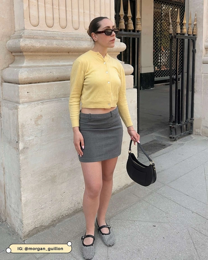 Windproof updo hairstyle for a romantic evening walk. Woman with a braided bun strolling through a park in the evening breeze.