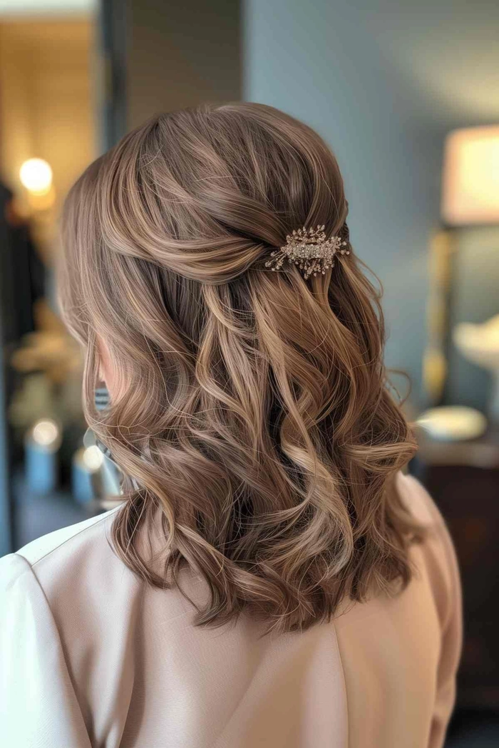 Medium length romantic curls styled for an evening date with soft volume and subtle shine