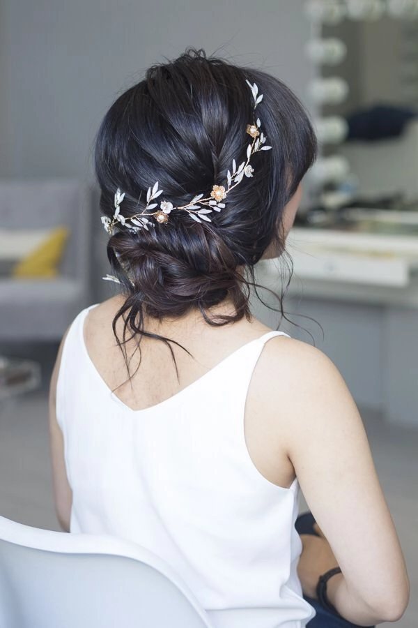 Sleek Asian evening updo with smooth finish for date night hairstyle