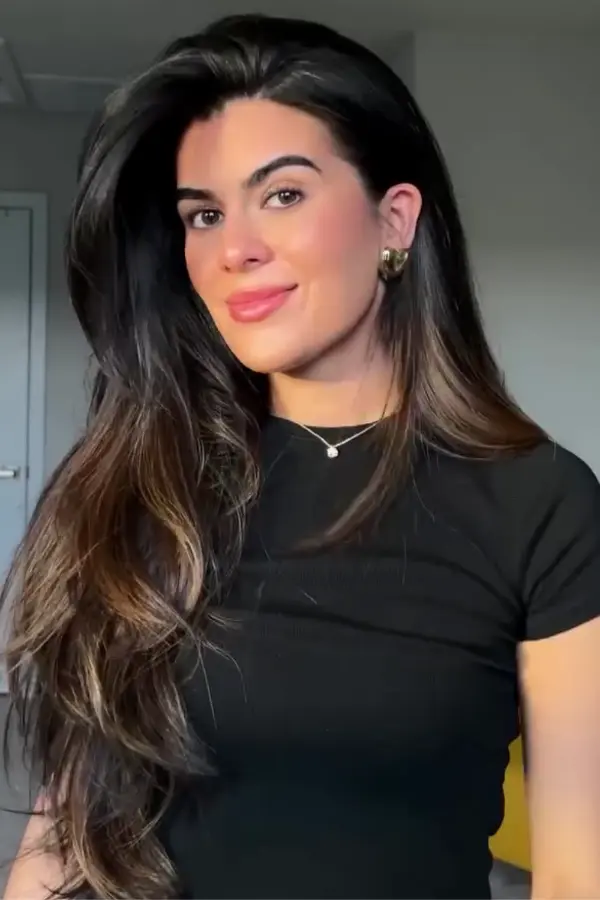 Stunning Latina blowout hairstyle for romantic date night Voluminous Latina date night blowout with soft waves
