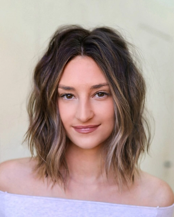 Romantic lob waves styled for an elegant date night cocktail party Women with a long bob featuring soft romantic waves, dressed for a cocktail evening