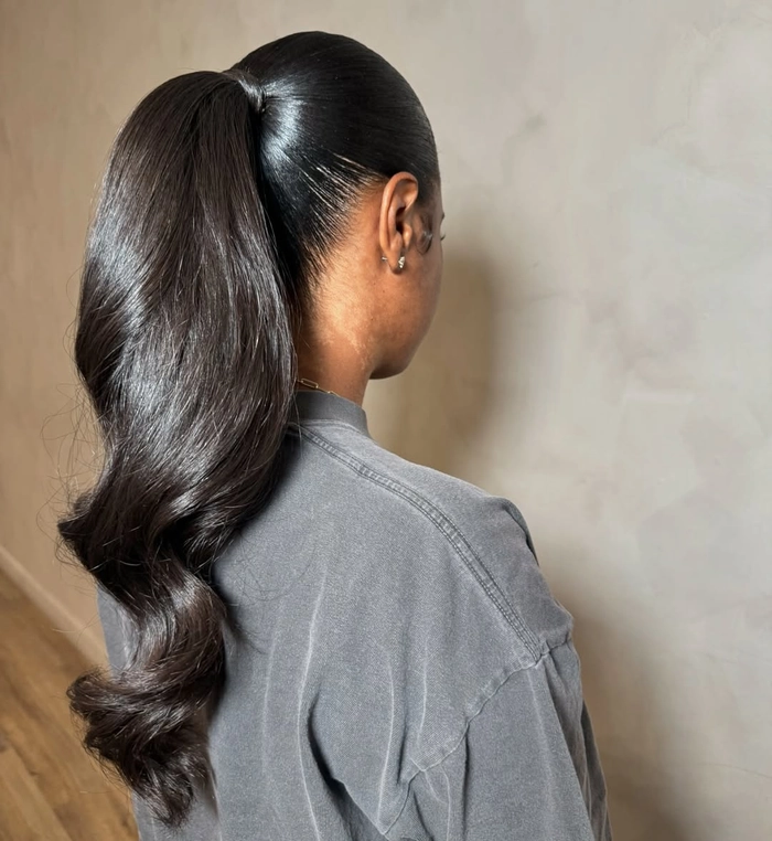 Elegant long sleek ponytail hairstyle for a romantic dinner date