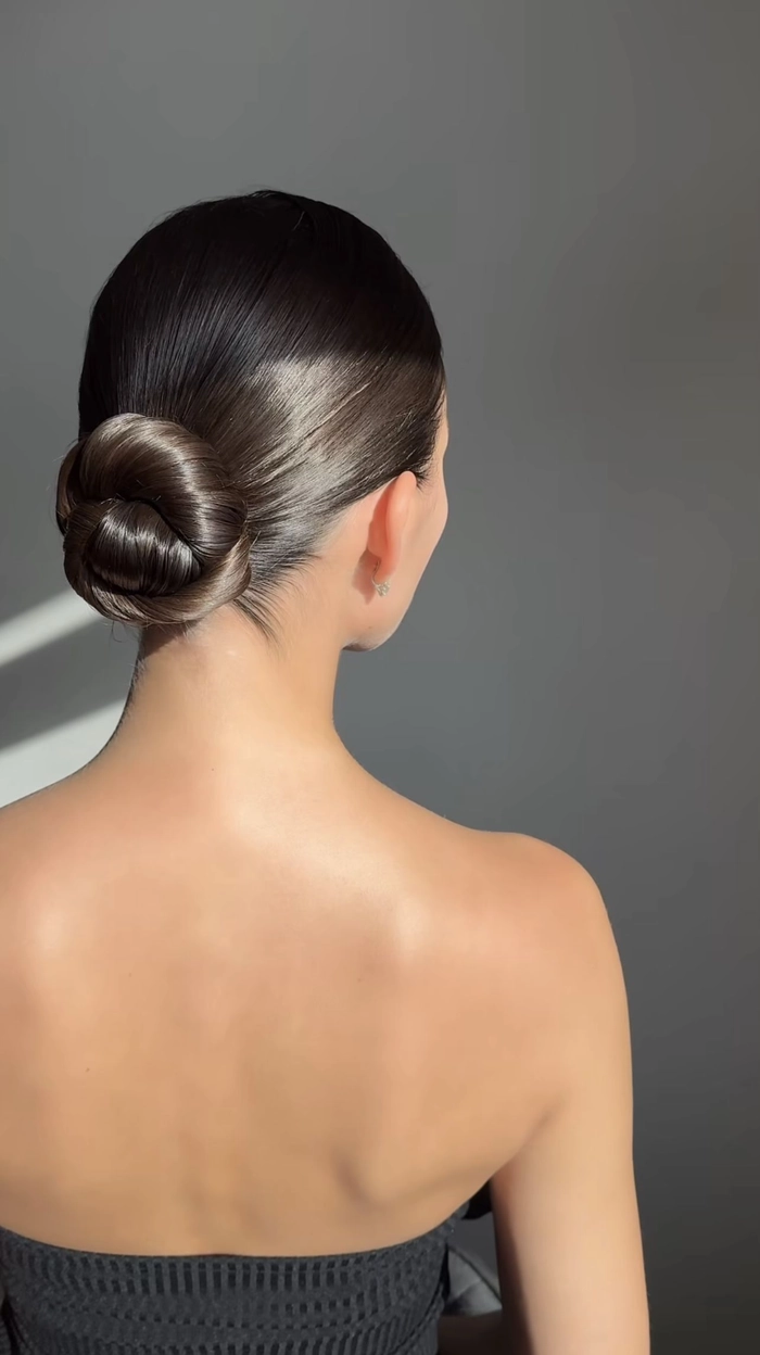 Modern Minimalist Chignon for Date Night Look Sleek modern minimalist chignon hairstyle perfect for a romantic date night