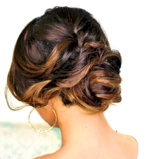 Romantic natural hair updo with soft curls and delicate accessories for an evening date