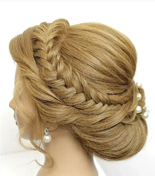 A romantic natural hair updo with soft curls and delicate accessories, styled for an elegant evening date