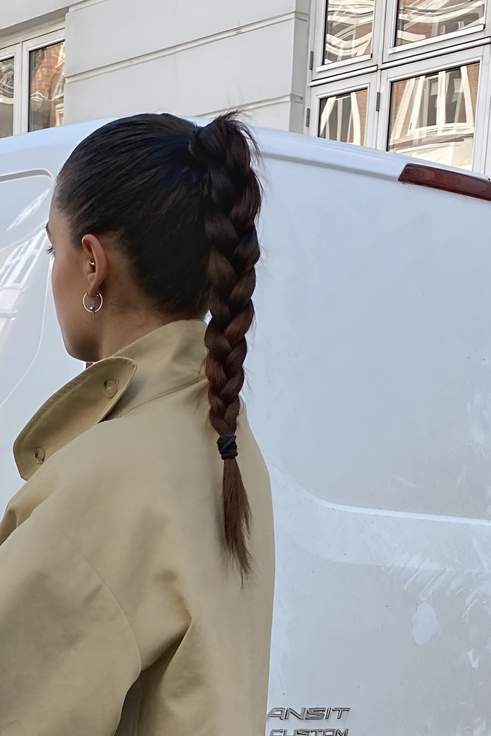 Polished low ponytail for winter evenings - date night hair style Elegant polished low ponytail hairstyle for a winter date night look