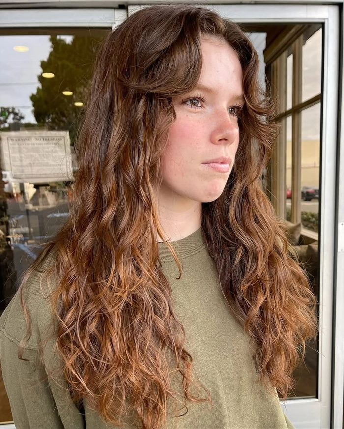 Romantic evening look featuring soft curtain bangs for a date night