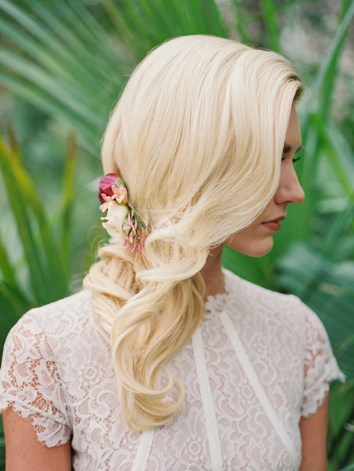 Romantic loose waves with floral accents for a spring garden dinner date
