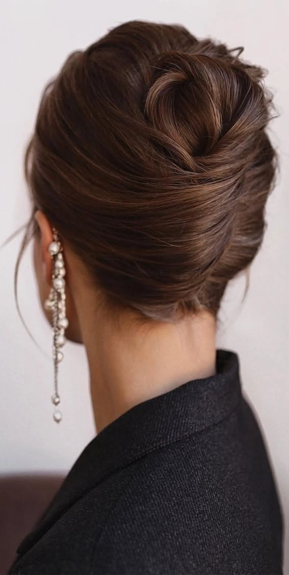 Elegant French twist hairstyle perfect for romantic formal dates Romantic French twist adorned with delicate pins for an elegant formal date night look