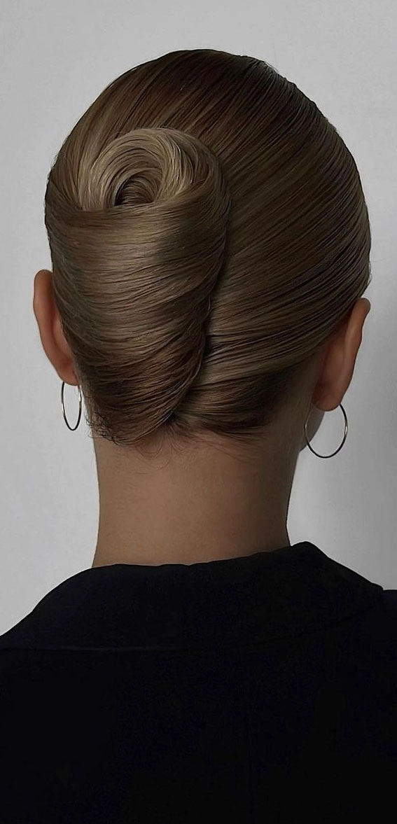 Romantic French Twist Hairstyle Perfect for a Formal Date Night Elegant romantic French twist hairstyle for a formal date night, with soft texture and polished finish