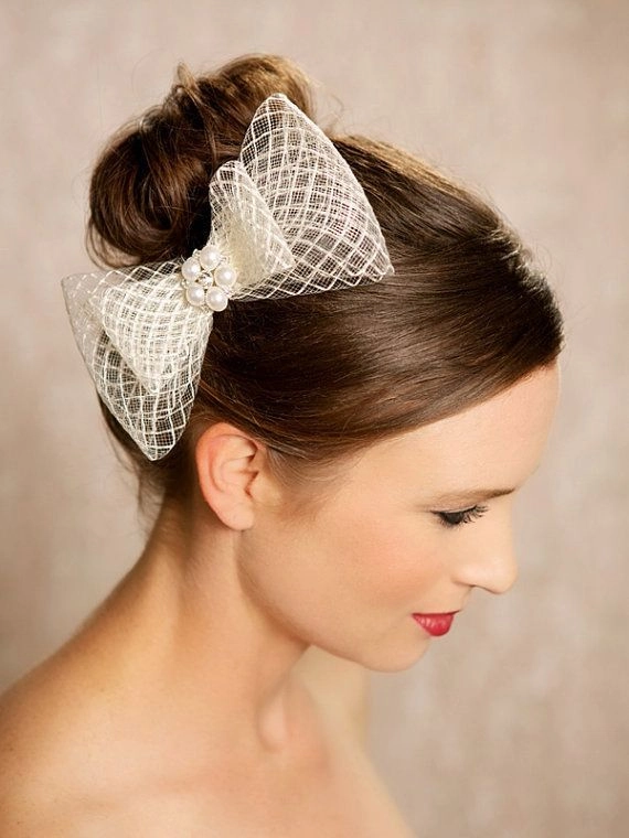 Romantic date night hairstyle adorned with delicate lace hair accessories