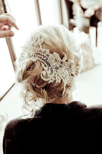 Romantic hairstyle with delicate lace hair accessories for a date night look