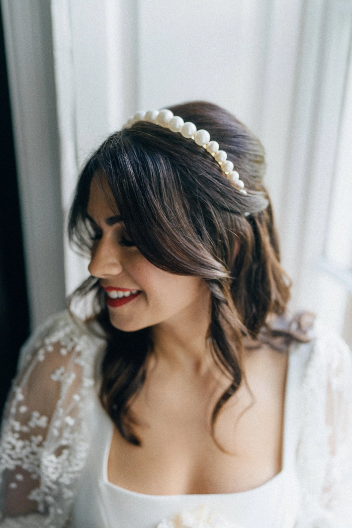 Romantic date night hairstyle featuring delicate lace hair accessories
