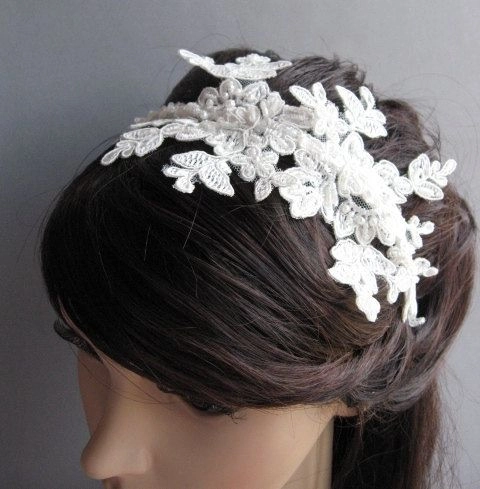 Romantic hairstyle accented with lace hair accessories for date night