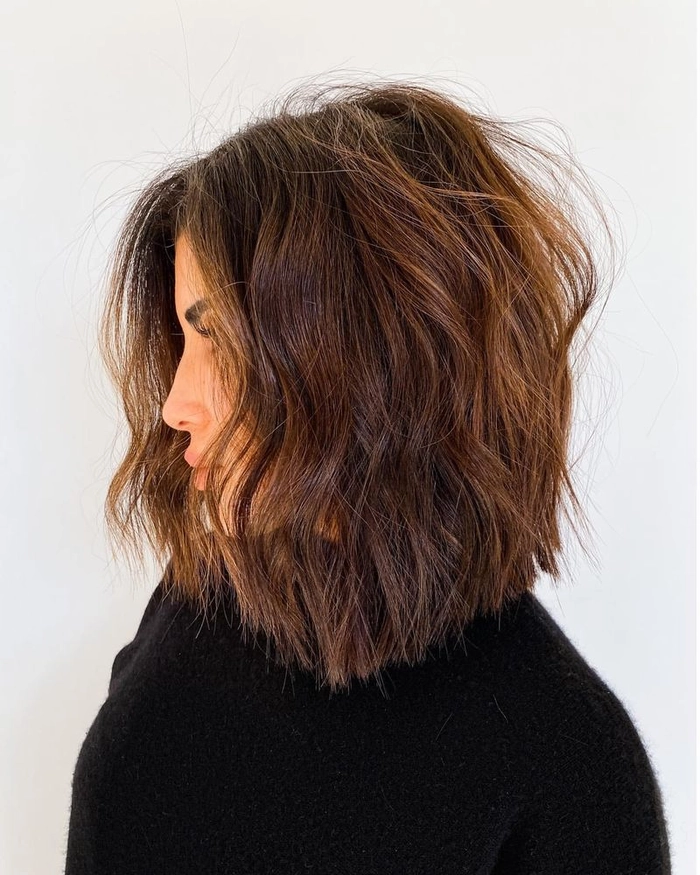 Elegant lob with soft waves perfect for cocktail evening hairstyles Woman with long bob romantic waves styled for cocktail evening date night