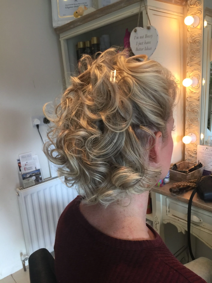 Short Hair Date Night Updos - Elegant Twisted Upstyle for Evening Out Effortless short hair updo for a romantic date night, styled with soft twists and volume