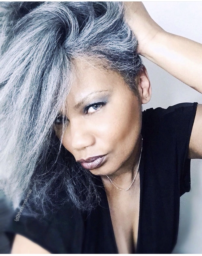 Elegant silver gray hairstyle with soft waves for a romantic evening out