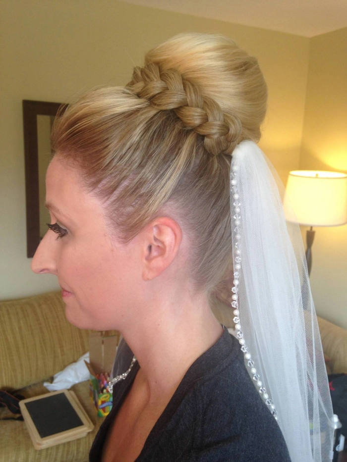 Sophisticated updo with twisted bun for formal evening events and special occasions Elegant top knot hairstyle for a romantic evening out, perfect for date night hair