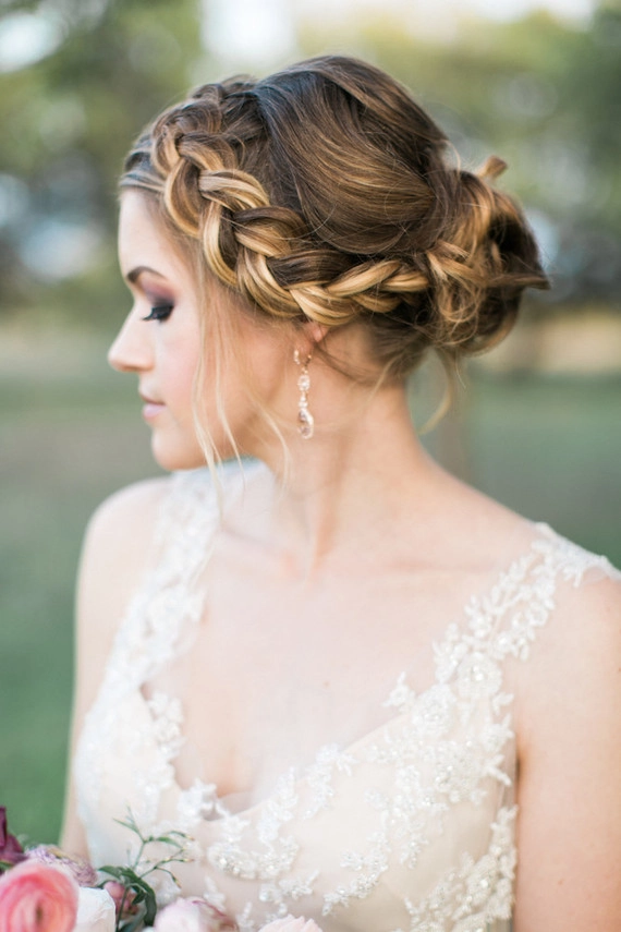 Romantic spring garden dinner hairstyle with soft waves and floral accents