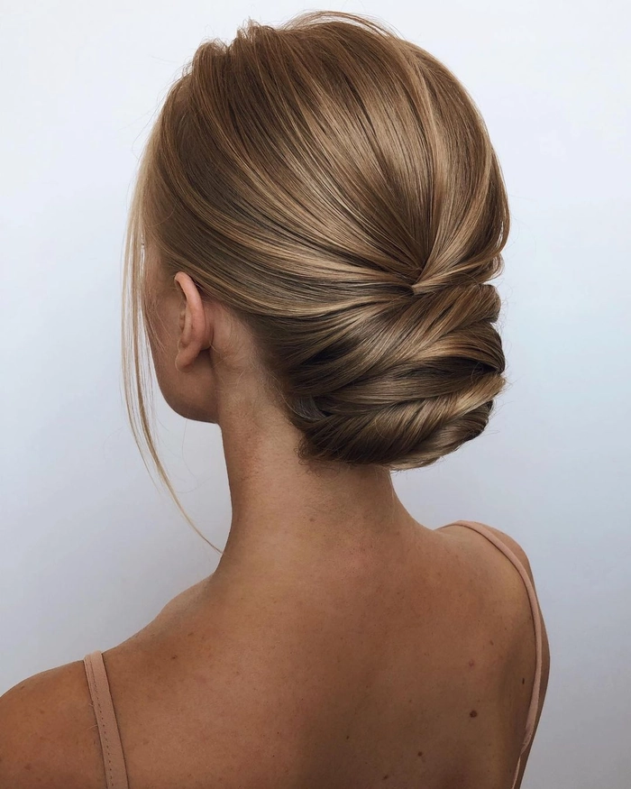 Elegant straight hair buns styled for a romantic date night
