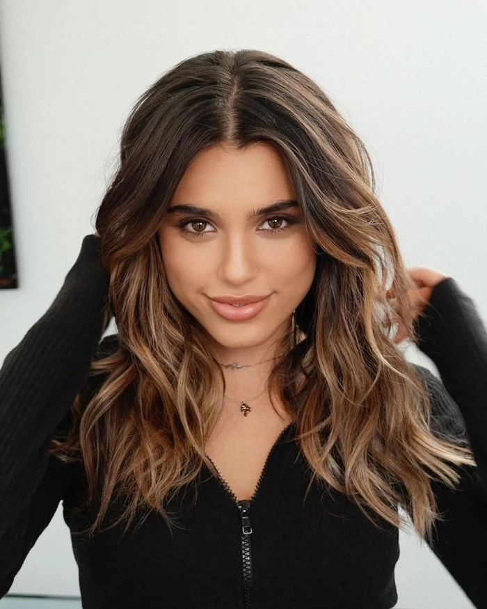 Date night hairstyle featuring soft tousled beach waves Effortless tousled beach waves for a romantic summer date night look