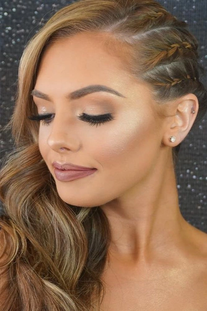 Valentine's Day hairstyle paired with red lip makeup for a romantic date night look