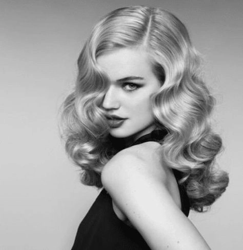Elegant date night hairstyle with soft waves and glamorous curls Vintage Hollywood waves hairstyle for a romantic anniversary dinner